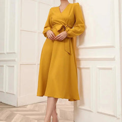 Mustard Belted Wrap Dress with Bishop Sleeves Surplice Neck High Waist & Flared Hem Midi Length