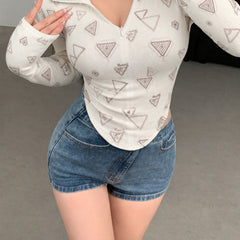 Beige printed zip collar top model view 6