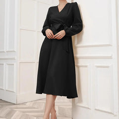 Black Belted Wrap Dress with Bishop Sleeves Surplice Neck High Waist & Flared Hem Midi Length
