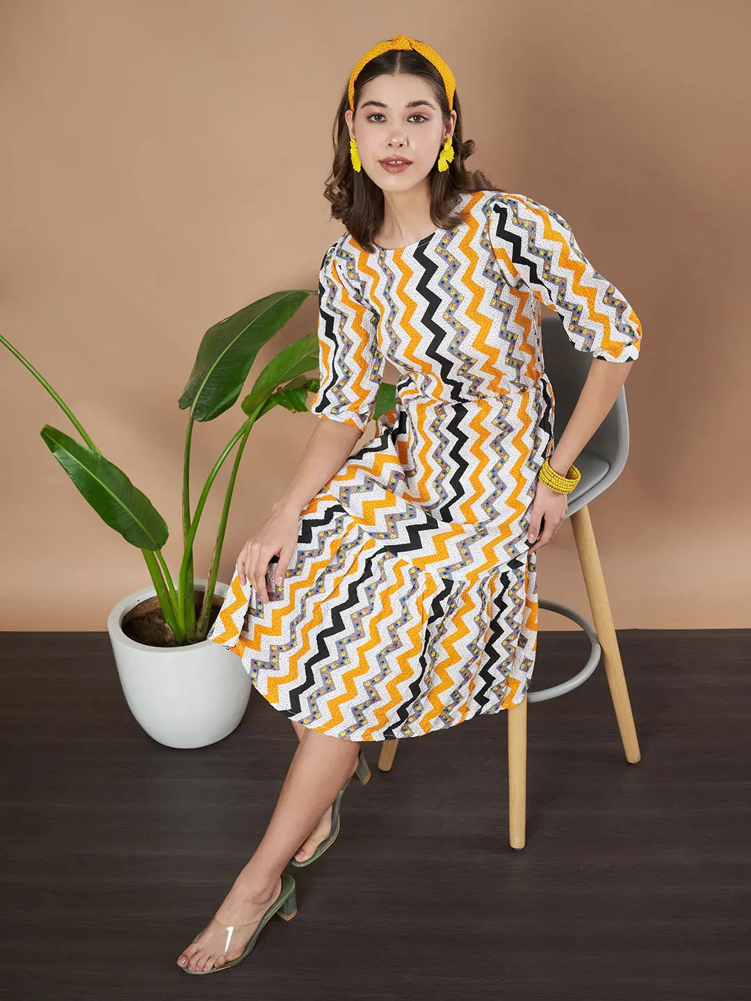 Mustard Zigzag Stripes Puff Sleeve Printed Fit & Flare Midi Dress with Round Neck, Short Sleeves, Gathered Details, and Flared Hemline