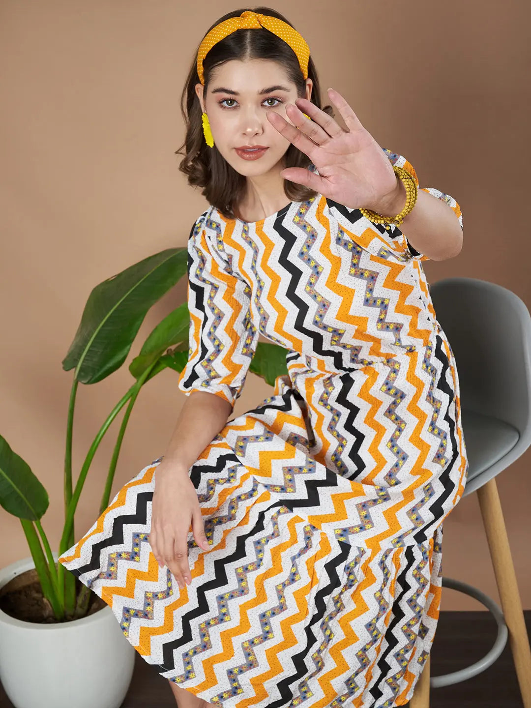 Mustard Zigzag Stripes Puff Sleeve Printed Fit & Flare Midi Dress with Round Neck, Short Sleeves, Gathered Details, and Flared Hemline