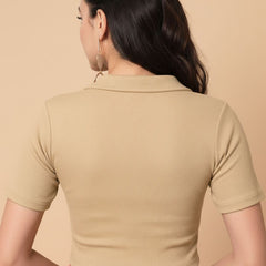 beige top