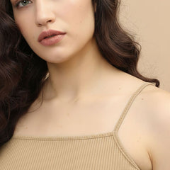 beige top