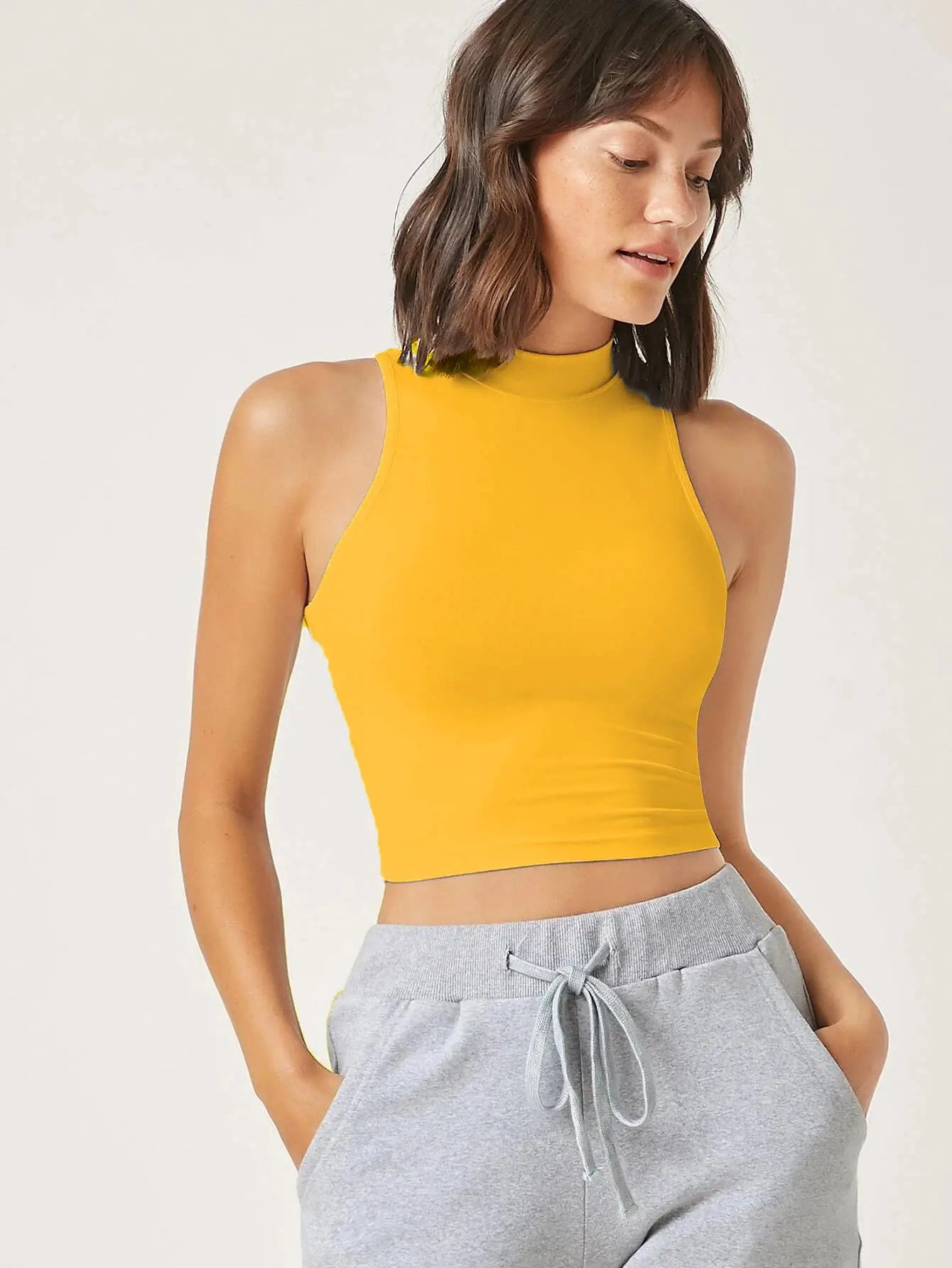 Women's & Girls Mustard Solid Mock Neck Rib/Knit Sleeveless Stretchable Slim Fit Crop Tank Top Istyle Can