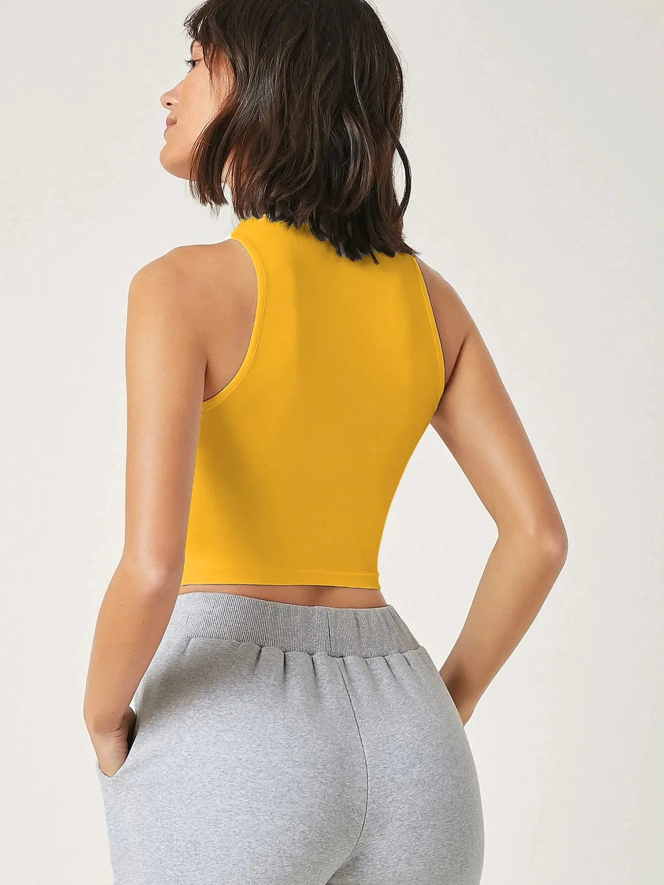 Women's & Girls Mustard Solid Mock Neck Rib/Knit Sleeveless Stretchable Slim Fit Crop Tank Top Secondary image